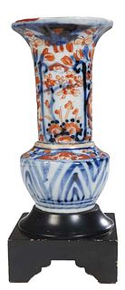 Diminutive Japanese Imari Baluster Vase, late 19th c., with floral decoration in blue and orange, now on a wooden plinth and wired as a lamp, H.- 10 1