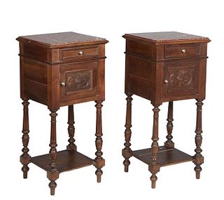 Pair of Henri II Style Carved Walnut Marble Top Nightstands, late 19th c., the inset highly figured rouge marble over a frieze drawer and a pot cupboa