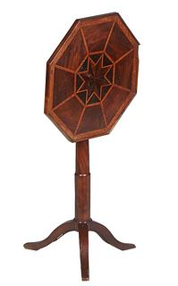 French Provincial Louis Philippe Inlaid Carved Walnut Tilt Top Table, late 19th c., the octagonal parquetry inlaid top on a turned tapered support to 