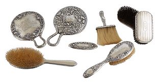Group of Eight Sterling Dresser Set Items, early 20th c., consisting of a set of three brushes, two for clothing and one for hair; a nail buffer handl