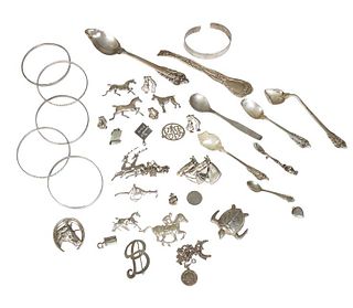 Group of Thirty-Eight Sterling Pieces, 20th c., consisting of six pieces of damaged flatware; a tortoise brooch; a Beau Horse and horseshoe brooch; a 
