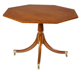 Inlaid Mahogany Tilt Top Dining Table, 20th c., by Baker, from The Collector's Edition, with metal tags under the top, the circular top on a turned an