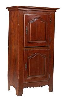 French Provincial Louis XIV Style Carved Cherry Homme Debout, 19th c., the stepped ogee crown over a fielded panel cupboard door with an iron fiche hi