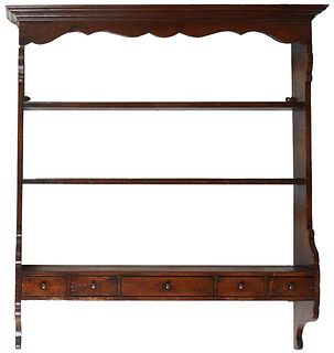 English Carved Mahogany Wall Mount Plate Rack, 19th c., the stepped crown over a scalloped skirt, on serpentine supports to three graduated grooved sh