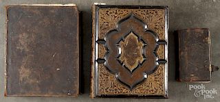 Three leather bound Bibles, 18th/19th c., to include a German New Testament