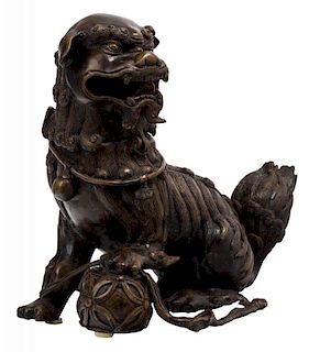 A CHINESE BRONZE STATUE OF A LION WITH A REMOVABLE HEAD, MING DYNASTY, 1368-1644