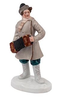AN EARLY SOVIET PORCELAIN FIGURE OF A GARMON PLAYER, DULYOVO, 1926-1929