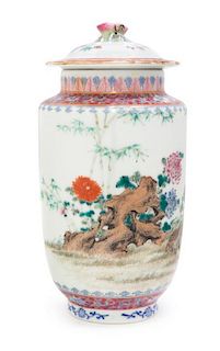 A Famille Rose Porcelain Jar and Cover Height 8 1/2 inches.