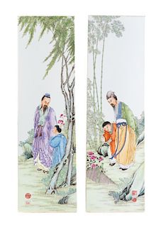 A Set of Four Polychrome Enameled Porcelain Plaques Height 29 1/4 x width 8 5/8 inches each.