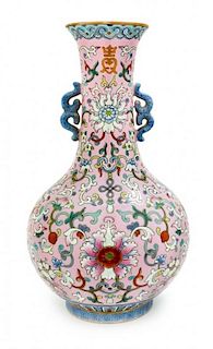 A Famille Rose Porcelain Vase Height 9 3/8 inches.