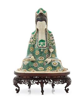 A Famille Verte Biscuit Figure of Guanyin Height of porcelain 9 1/4 inches.