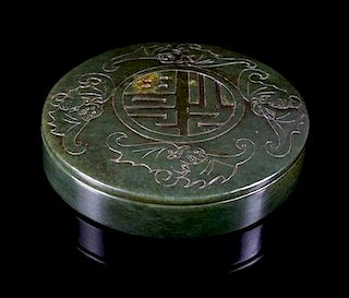 A Spinach Jade Circular Box and Cover Diameter 3 1/4 inches.