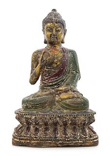 * A Polychrome Painted Iron Figure of Buddha Height 10 inches.