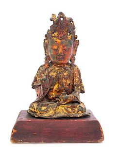 A Red and Gilt Lacquered Bronze Figure of Guanyin Height 9 1/2 inches.