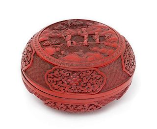A Cinnabar Lacquer Circular Box and Cover Height 3 3/4 x diameter 6 1/2 inches.