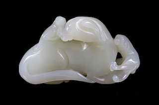 A Celadon Jade Toggle of Three Badgers Length 2 1/2 inches.