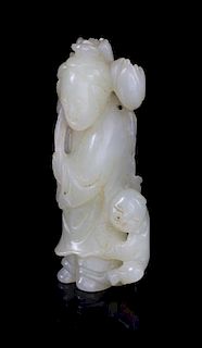 A Celadon Jade Figural Group Length 3 1/2 inches.