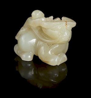 A Celadon Jade Figural Group Length 1 3/4 x height 1 inches.