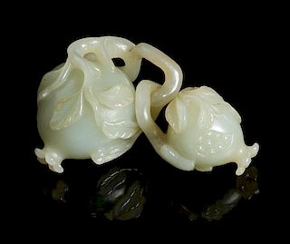 A Carved Celadon Jade Toggle Length overall 4 inches.