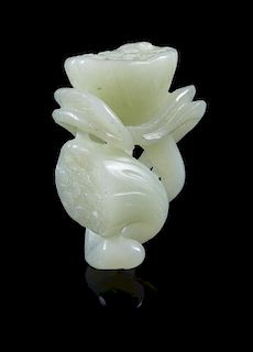 A Celadon Jade Toggle of Lotus Pods Length 2 1/4 inches.
