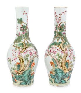 A Pair of Famille Rose Porcelain Vases Height 9 3/8 inches.
