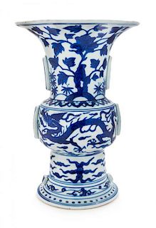 A Blue and White Porcelain Gu-Form Vase Height 11 1/4 inches.
