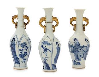 * Three Parcel-Gilt Blue and White Porcelain Vases Height of tallest 6 1/2 inches.