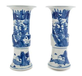 A Pair of Blue and White Porcelain Gu Form Vases Height 4 7/8 inches.