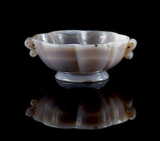 A Mughal-Style Carved Agate Cup Height 1 1/2 inches.