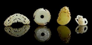 Four Carved Jade Pendants Length of longest 3 1/4 inches.