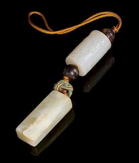 Two Jade Pendants Length 1 1/8 inches.
