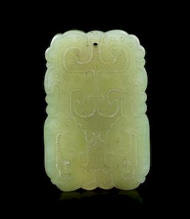 A Yellow Jade Pendant Length 1 7/8 inches.
