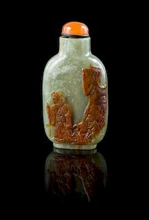 * A Carved Celadon Jade Snuff Bottle Height 2 3/4 inches.