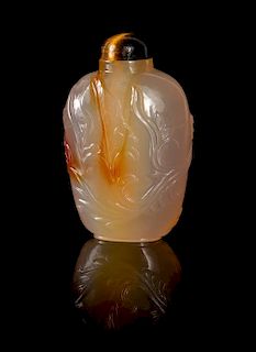 * A Carved Agate Snuff Bottle Height 2 3/4 inches.