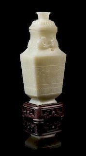 * A Chinese White Jade Vase and Cover Height 7 inches.