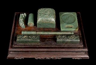 * A Set of Chinese Spinach Jade Writing Implements Height overall 5 7/8 inches.
