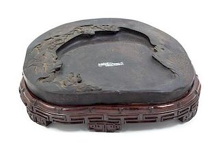 * A Chinese Duan Inkstone Length 13 3/4 inches.