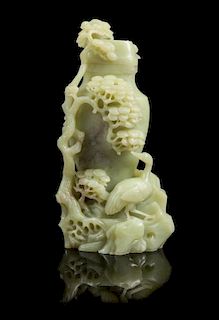 * A Chinese Mottled Celadon Jade Vase and Cover Height 8 1/2 inches.