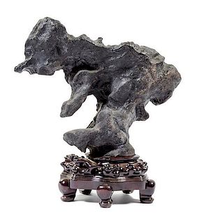 * A Chinese Lingbi Scholar's Rock Height overall 23 1/4 inches.