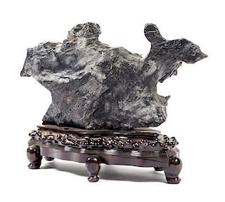 * A Chinese Lingbi Scholar's Rock Height overall 22 1/2 x length 32 inches.