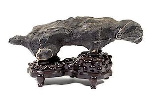 * A Chinese Lingbi Scholar's Rock Height overall 13 1/2 x length 26 inches.