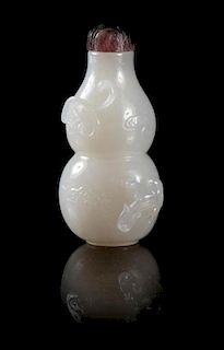* A Chinese White Jade Snuff Bottle Height 2 3/8 inches.