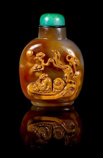 * A Chinese Carved Agate Snuff Bottle Height 3 inches.