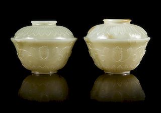 * A Pair of Chinese Celadon Jade Covered Tea Bowls Diameter 3 3/4 inches.