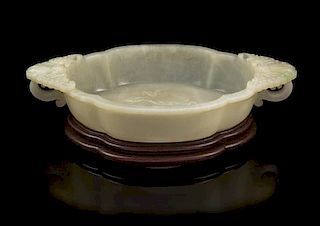 * A Chinese White Jade Marriage Bowl Width over handles 10 inches.