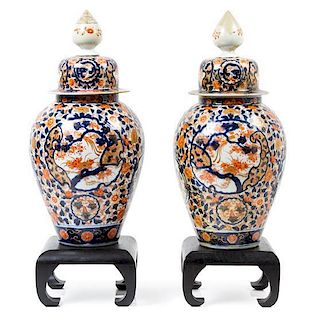 A Pair of Imari Porcelain Jars and Covers Height 17 inches.