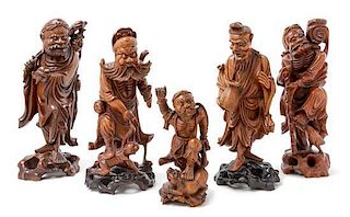 * Five Carved Boxwood Figures Height of tallest 14 inches.