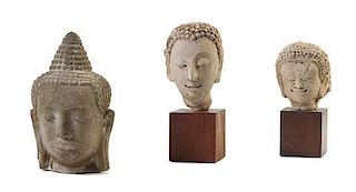 * Three Thai Stone Heads of Buddha Height of tallest 10 1/2 inches.