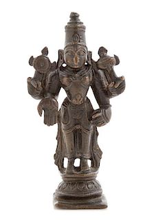 * An Indian Bronze Figure of a Standing Deity Height 4 inches.