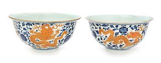 A Pair of Gilt and Iron Red Decorated Underglaze Blue Porcelain Bowls Diameter 6 inches.